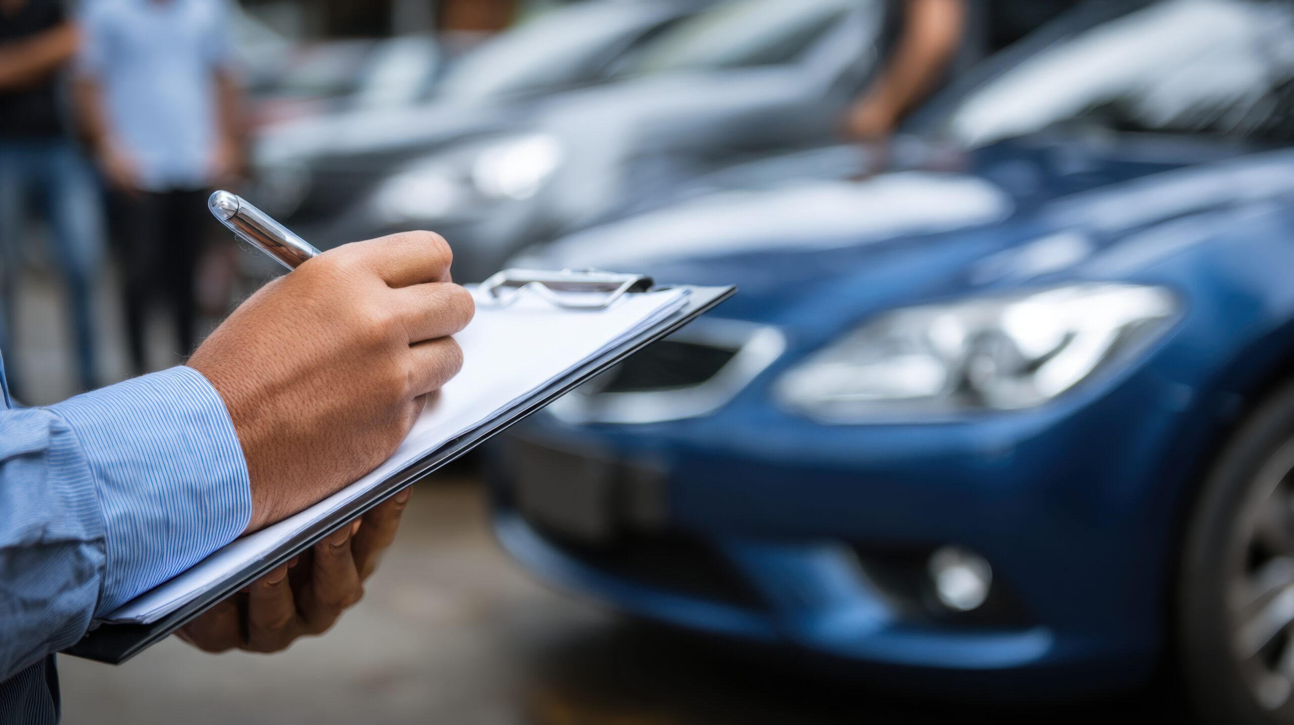 Investigator reviewing claim file in an insurance fraud in Florida case